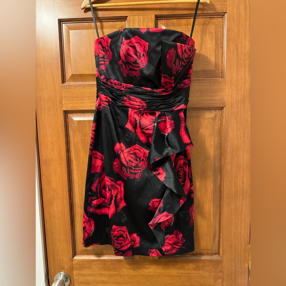 Never worn, tags still on. 
Perfect cocktail or Christmas party dress.